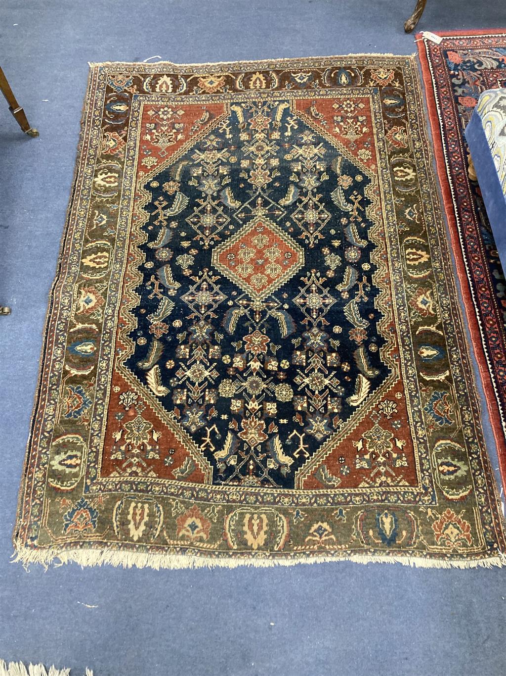 A North West Persian blue ground rug, 164 x 118cm